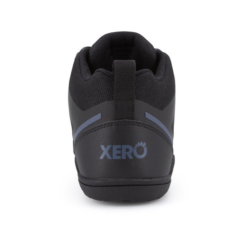 Daylite Hiker Fusion Women Black Barfußschuhe Wanderschuhe – Ansicht von hinten. Diese Schuhe bieten eine robuste Konstruktion und eine gute Passform, ideal für Outdoor-Aktivitäten und Wanderungen, mit einem klaren, modernen Look.
Erhältlich in unserem Onlineshop für Barfußschuhe.