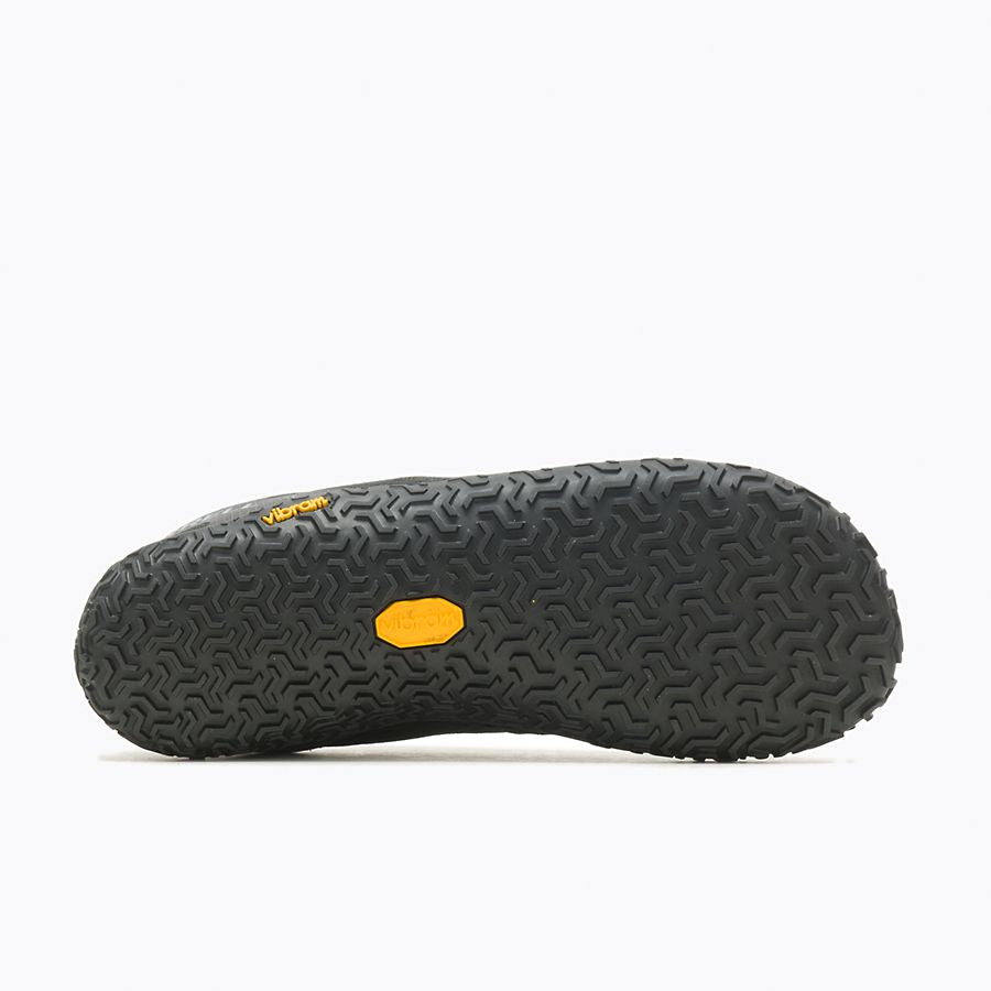 Barfußschuhe Merrell Vapor Glove 6 in Schwarz für Damen, Ansicht von unten, erhältlich in unserem Onlineshop für Barfußschuhe. Rutschfeste Sohle für sicheren Halt und Flexibilität auf verschiedenen Oberflächen.