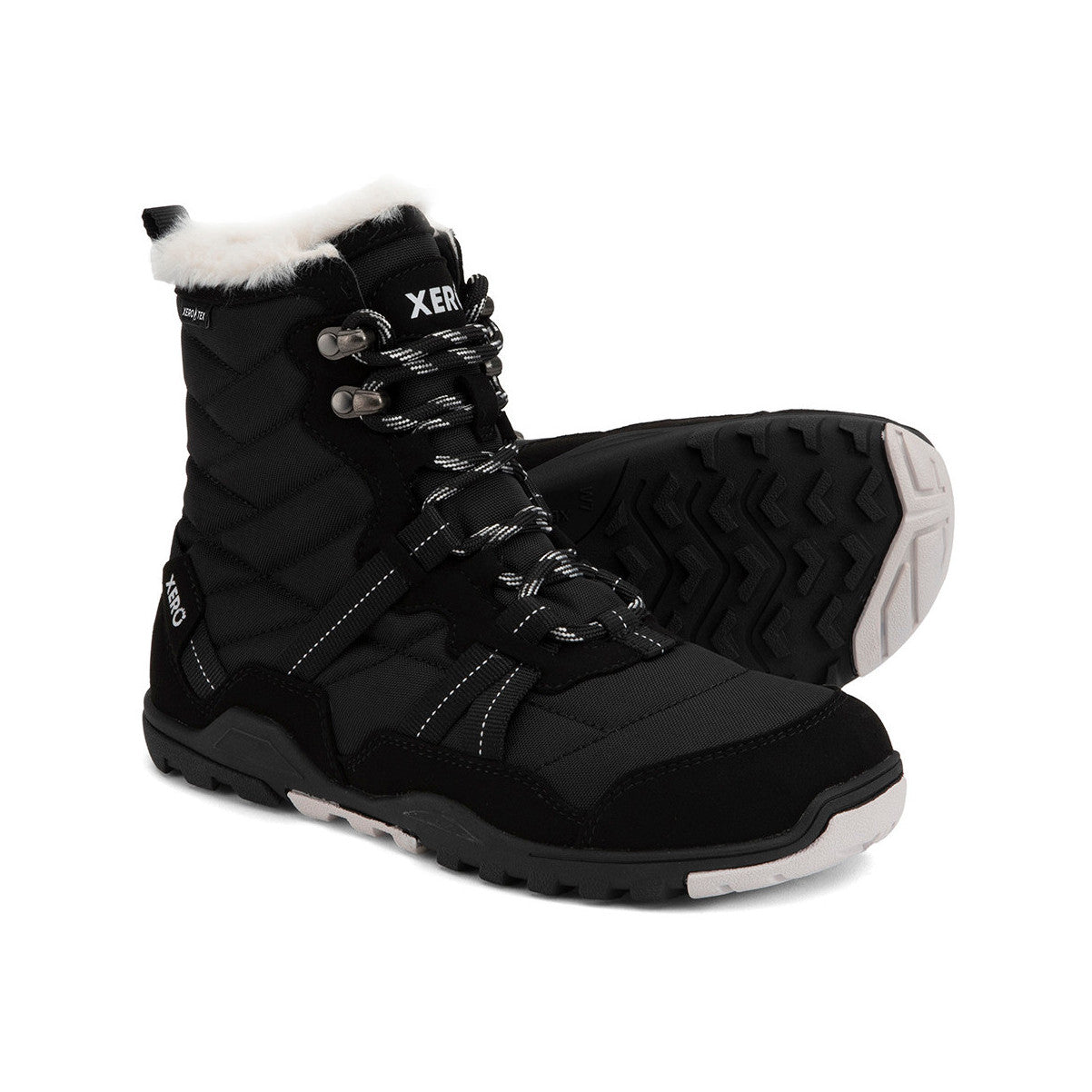 Xero Shoes Alpine Women Barfußschuhe Schneestiefel in Black White bieten leichten, flexiblen und warmen Schutz für den Winter. Erhältlich in unserem Onlineshop für Barfußschuhe.