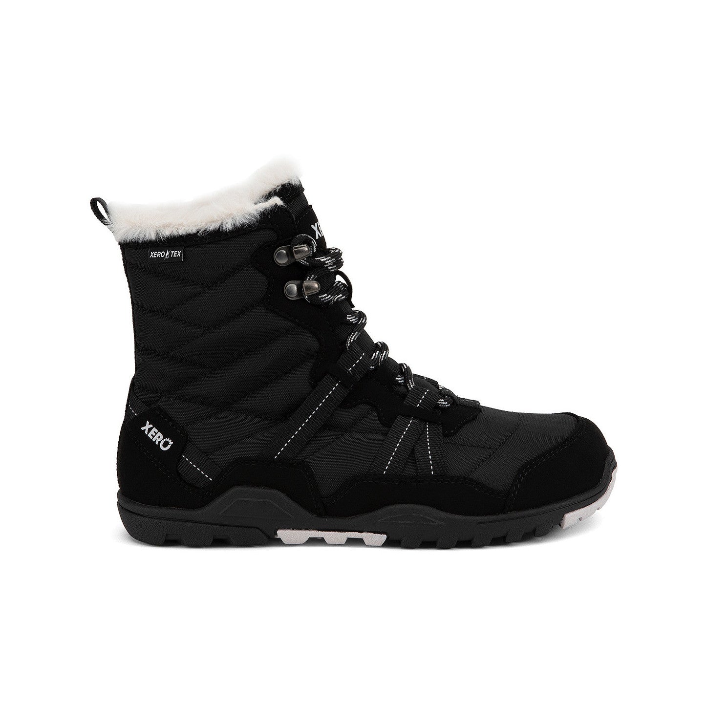 Xero Shoes Alpine Women Barfußschuhe Schneestiefel in Black White, Ansicht von rechts. Leichte, flexible Winterstiefel, die natürlichen Komfort und Wärme bieten. Erhältlich in unserem Onlineshop für Barfußschuhe.