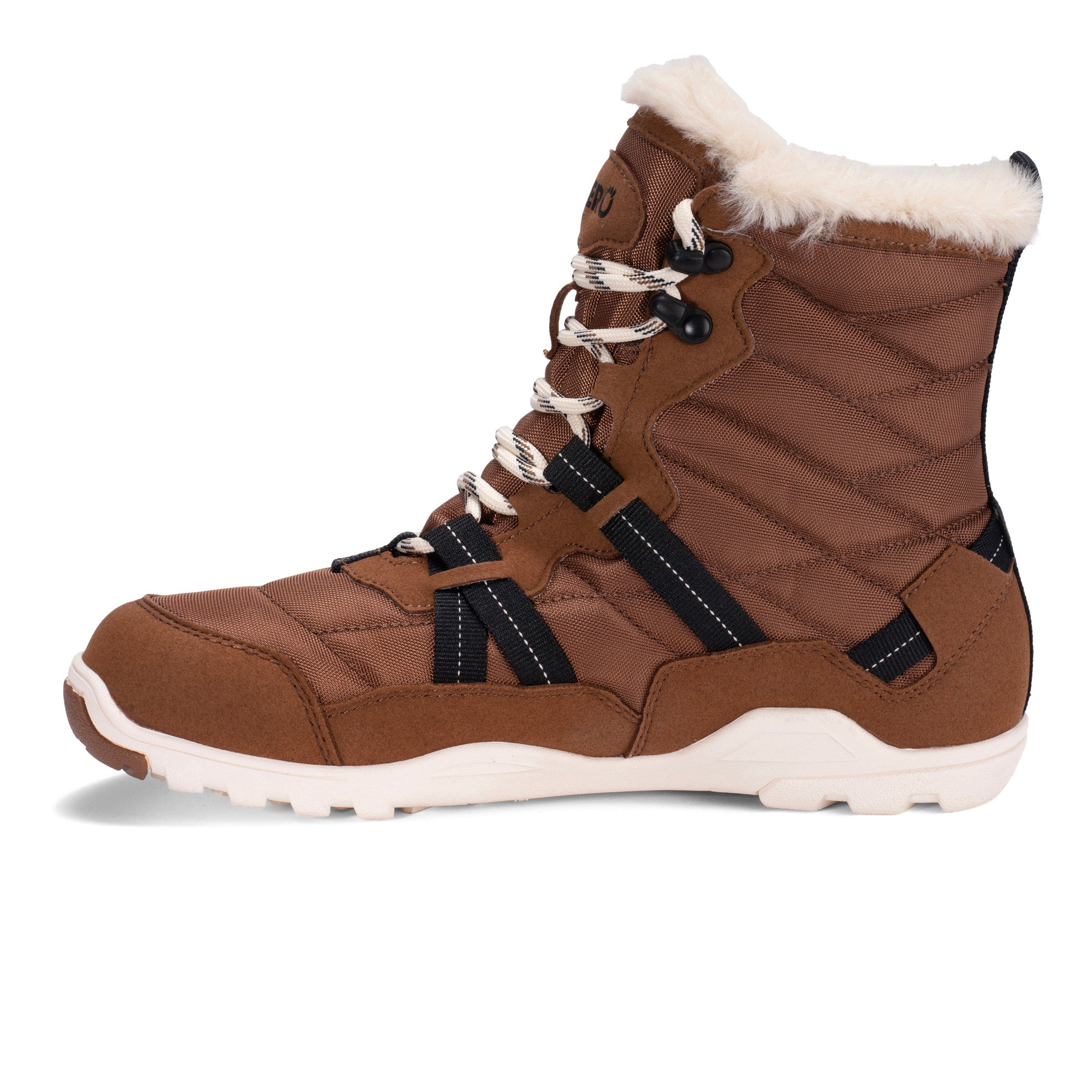 Xero Shoes Alpine Women Barfußschuhe Schneestiefel in Rubber Brown, Ansicht von links. Leichte, flexible Winterstiefel, die natürlichen Komfort und Wärme bieten. Erhältlich in unserem Onlineshop für Barfußschuhe.