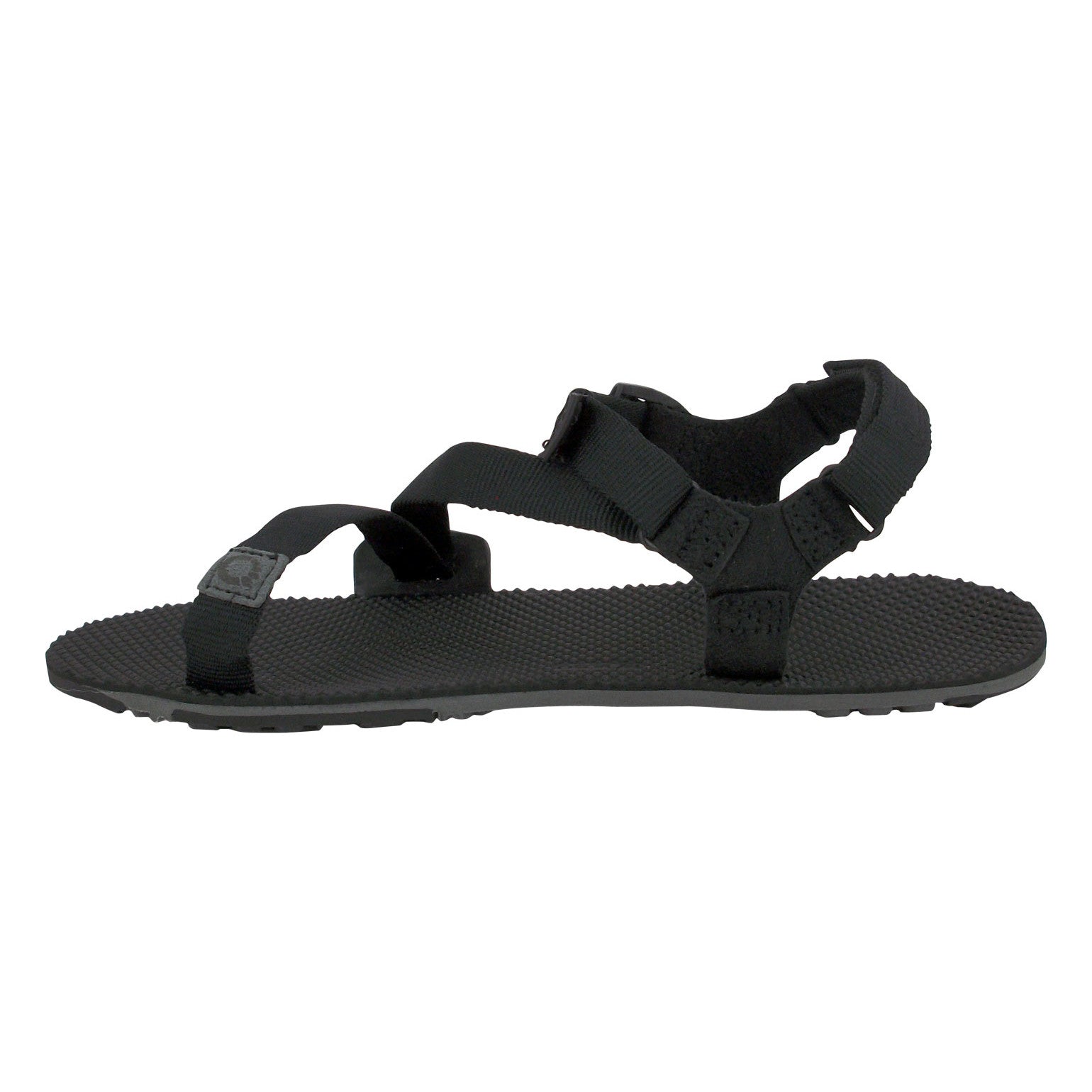 Xero Shoes Naboso Trail Barfußschuhe Sandalen in Schwarz von der linken Seite im Onlineshop für Barfußschuhe