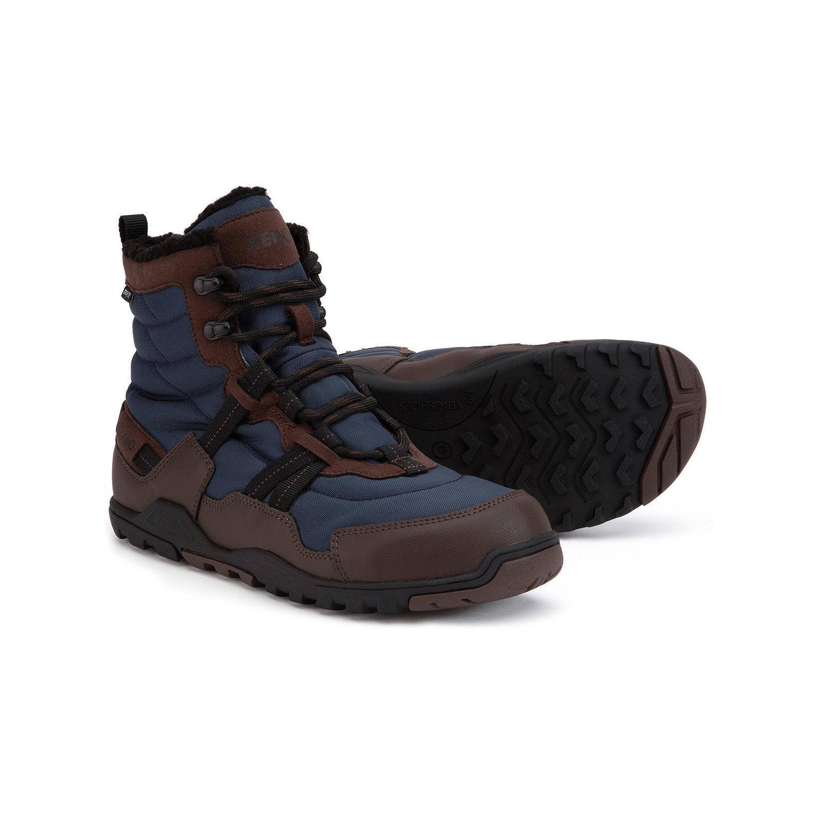 Xero Shoes Alpine Men Brown Navy Barfußschuhe Schneestiefel für den Winter, allgemeine Ansicht. Robuste, flexible Winterstiefel für den Outdoor-Einsatz bei kaltem Wetter. Erhältlich in unserem Onlineshop für Barfußschuhe.