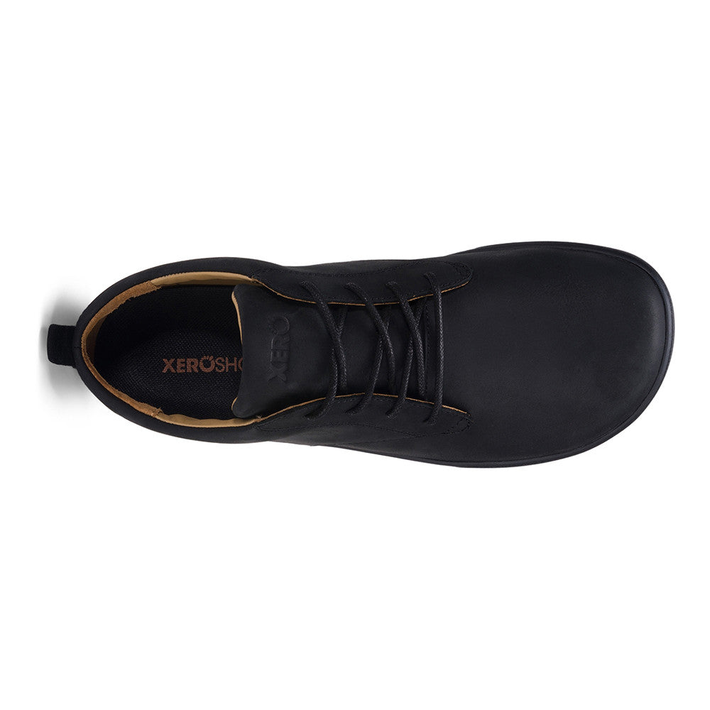 Xero Shoes Glenn Barfußschuhe für Herren in Schwarz aus Leder, aus der Perspektive von oben, bieten eine flexible Sohle für maximalen Komfort und Unterstützung bei jedem Schritt. Ideal für natürliche Bewegungen und aktiven Lebensstil. Erhältlich in unserem Onlineshop für Barfußschuhe.