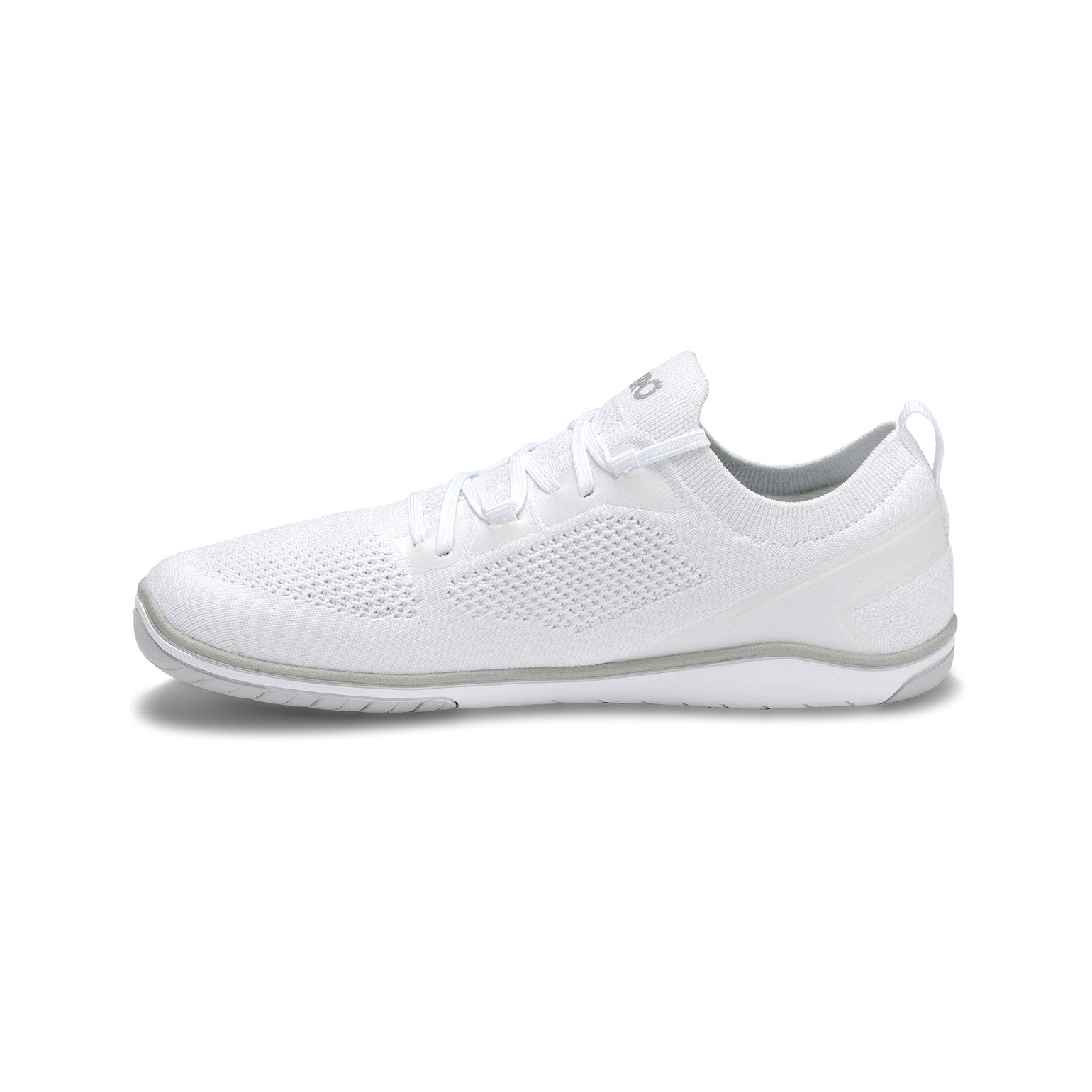 Xero Shoes Nexus Knit Sneaker in Weiß für Damen, linke Seitenansicht, atmungsaktiv und flexibel, ideal für unseren Onlineshop für Barfußschuhe.