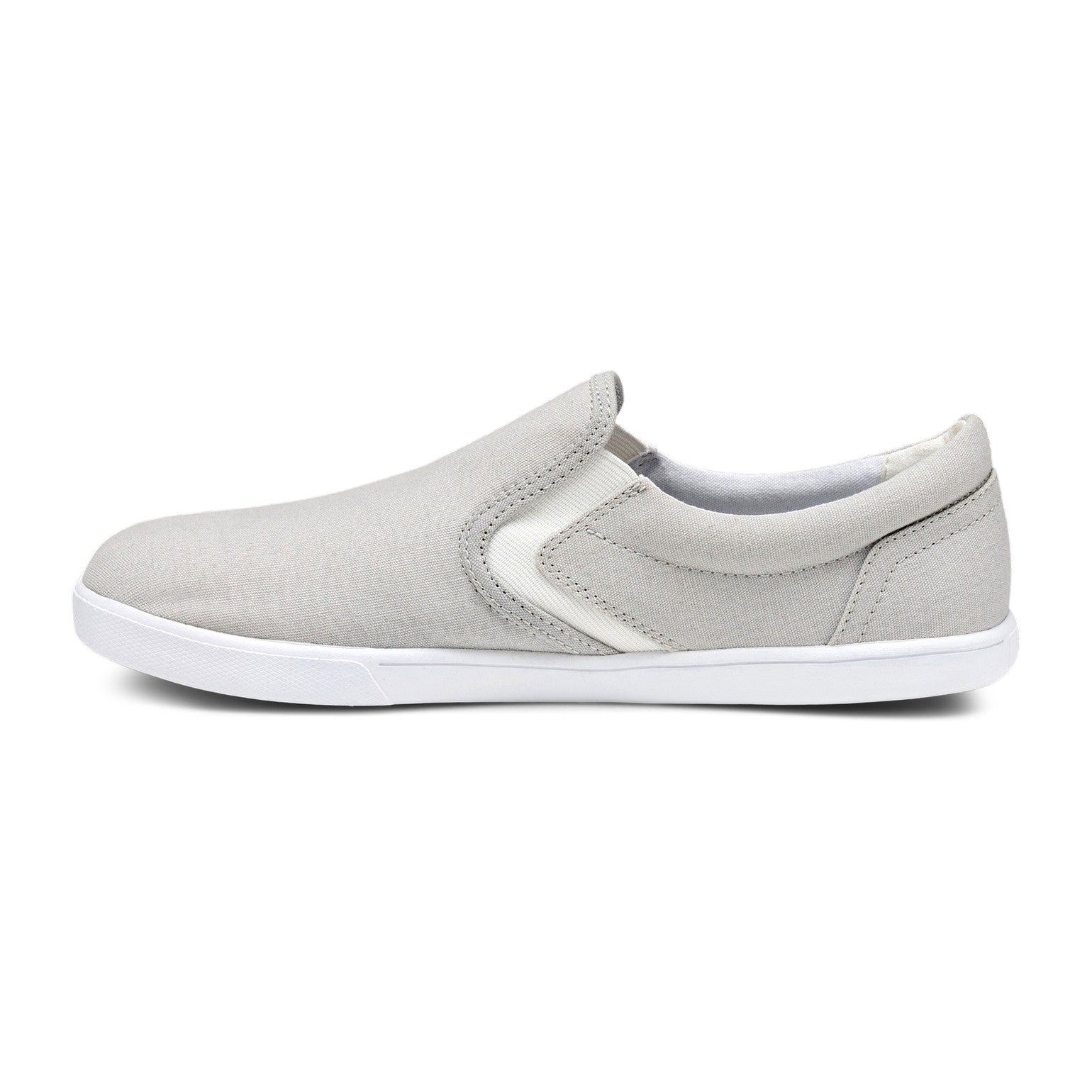 Xero Shoes Dillon Canvas Slip-On Barfußschuhe für Herren in Lunar Rock aus der linken Seitenansicht, bequem und ideal für den Alltag. Erhältlich in unserem Onlineshop für Barfußschuhe.