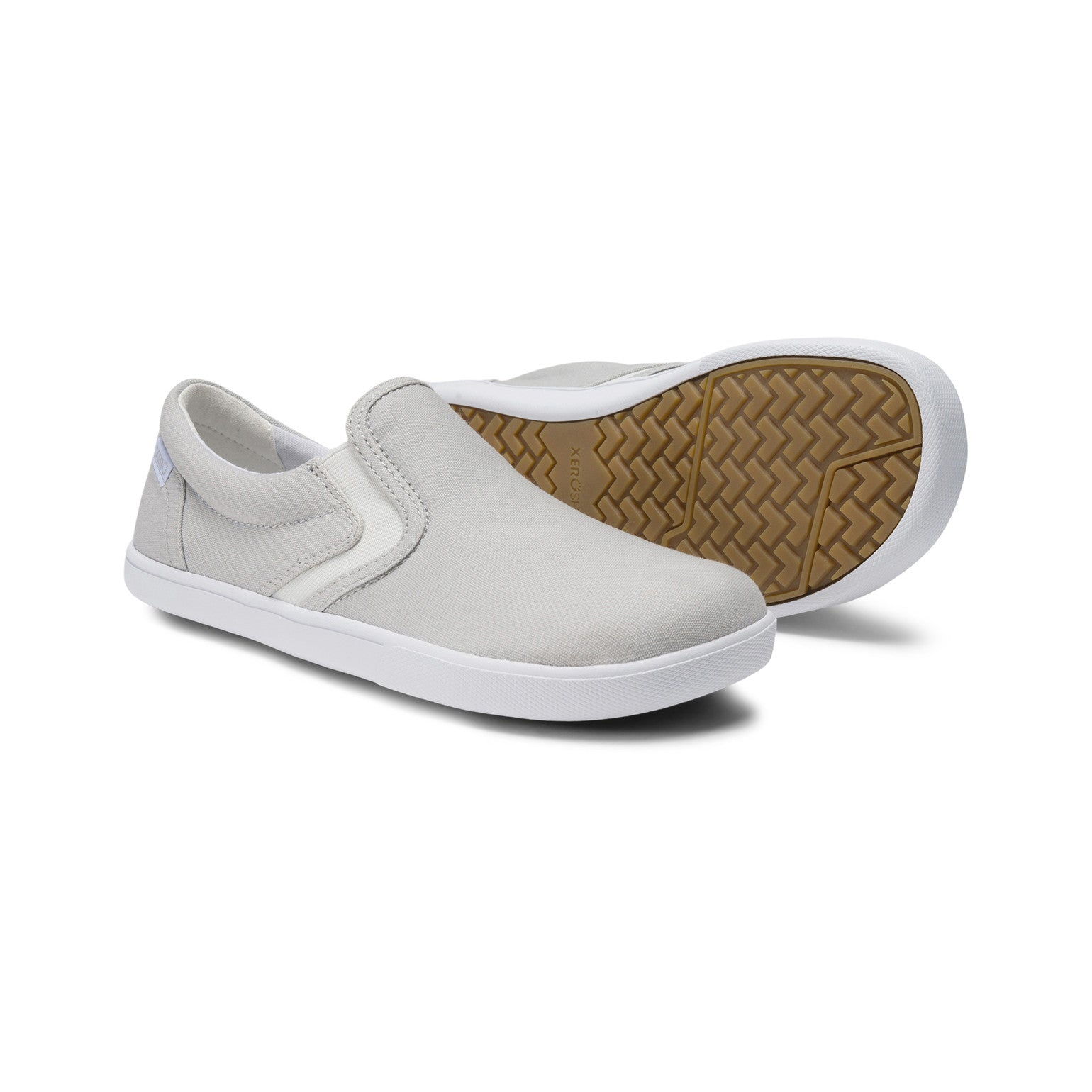 Xero Shoes Dillon Canvas Slip-On Barfußschuhe für Damen in Lunar Rock, bequem und vielseitig für den Alltag. Erhältlich in unserem Onlineshop für Barfußschuhe.