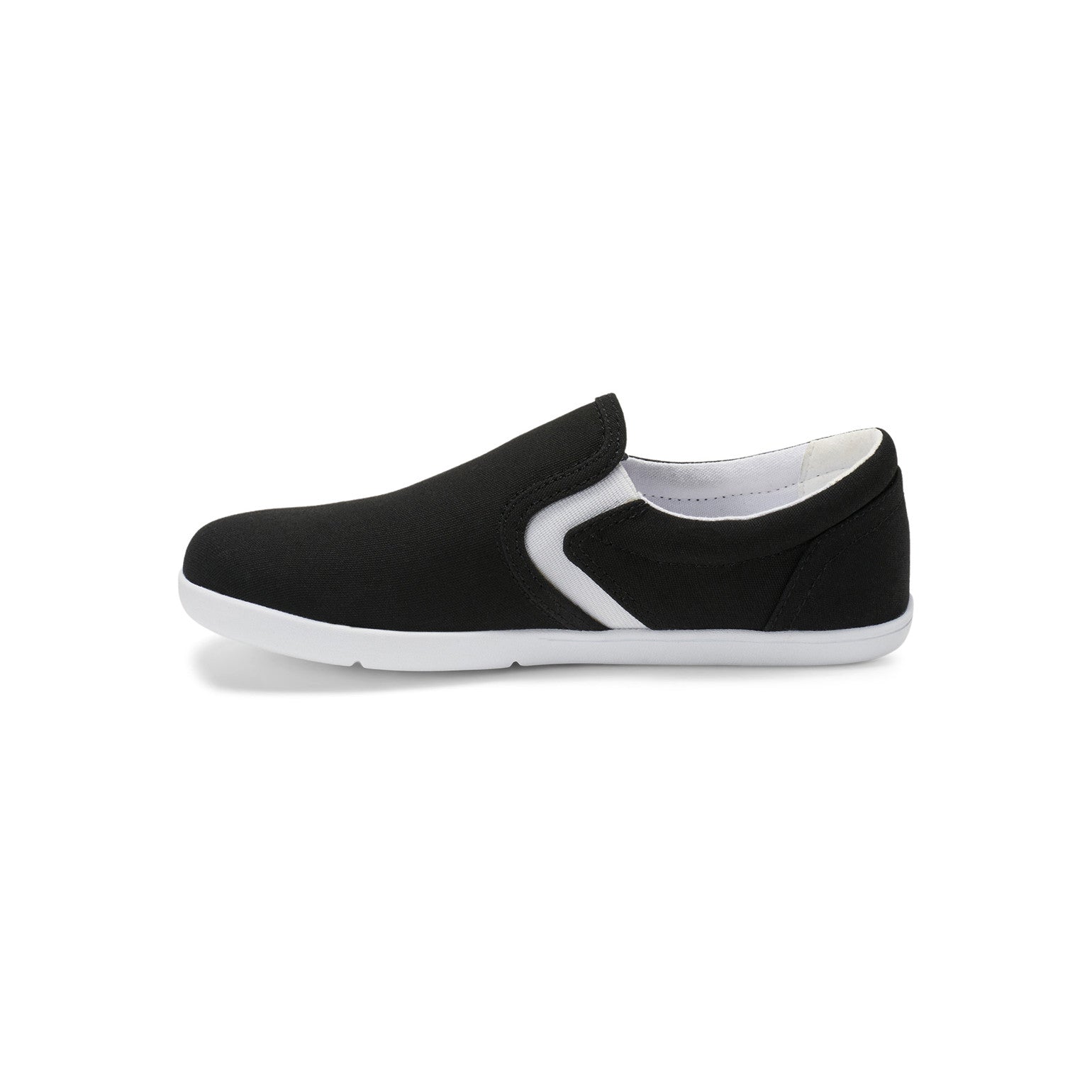 Linke Seitenansicht der Xero Shoes Dillon Canvas Slip-On Kinder Barfußschuhe in Schwarz als Sneaker im Onlineshop für Barfußschuhe