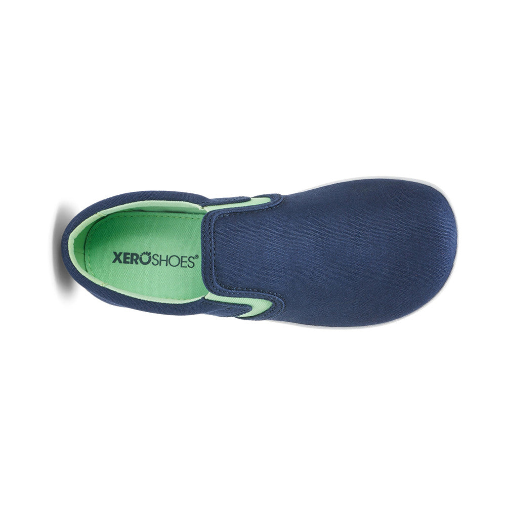 Obere Ansicht der Xero Shoes Dillon Canvas Slip-On Kinder Barfußschuhe in Insignia Blue als Sneaker im Onlineshop für Barfußschuhe