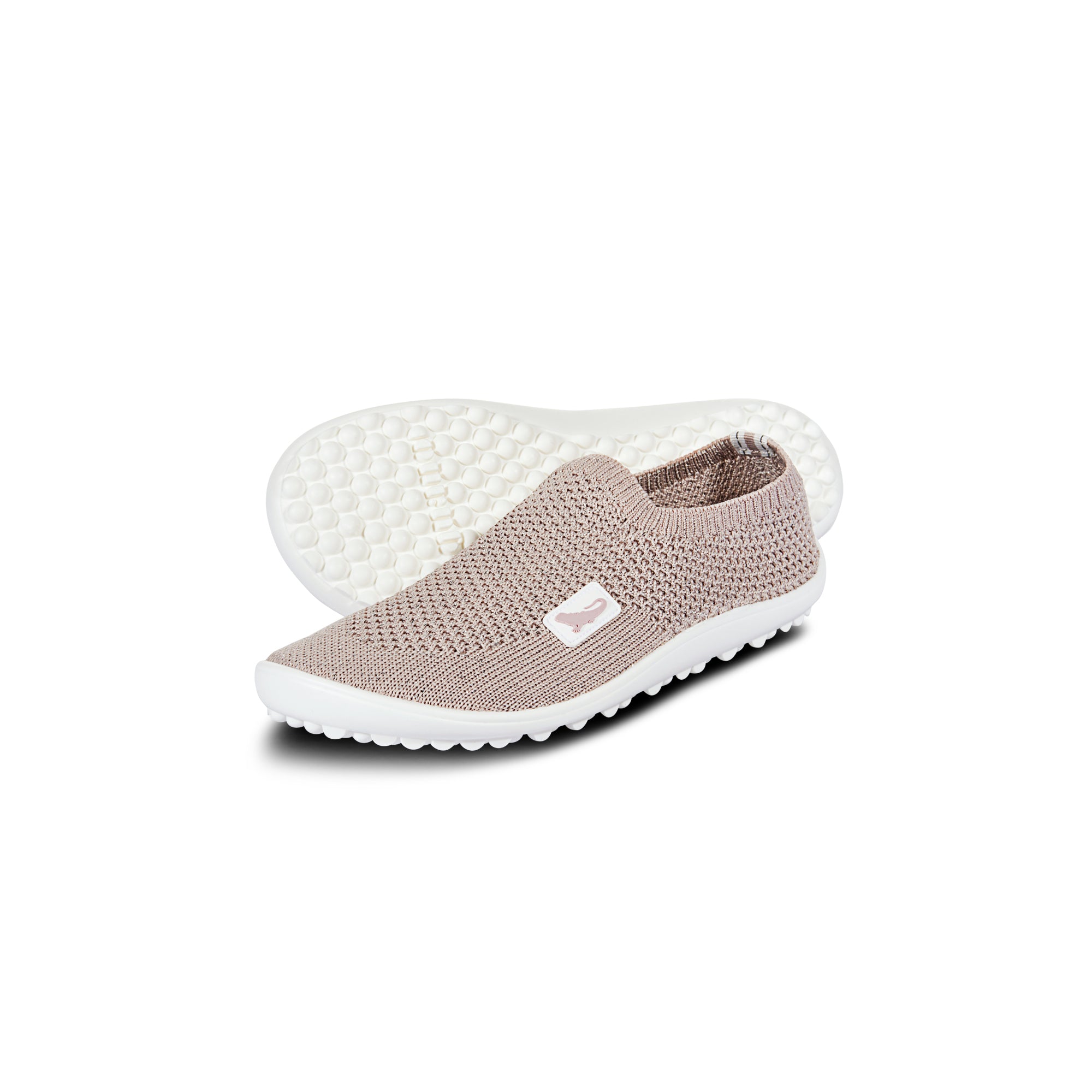 Leguanito Scio Rose Kinder Barfußschuhe Slipper – Bild des Slippers in Rosa für Kinder in den Größen 29 bis 34. Diese leichten Barfußschuhe bieten optimalen Tragekomfort und sind erhältlich bei barfusswelten.de.