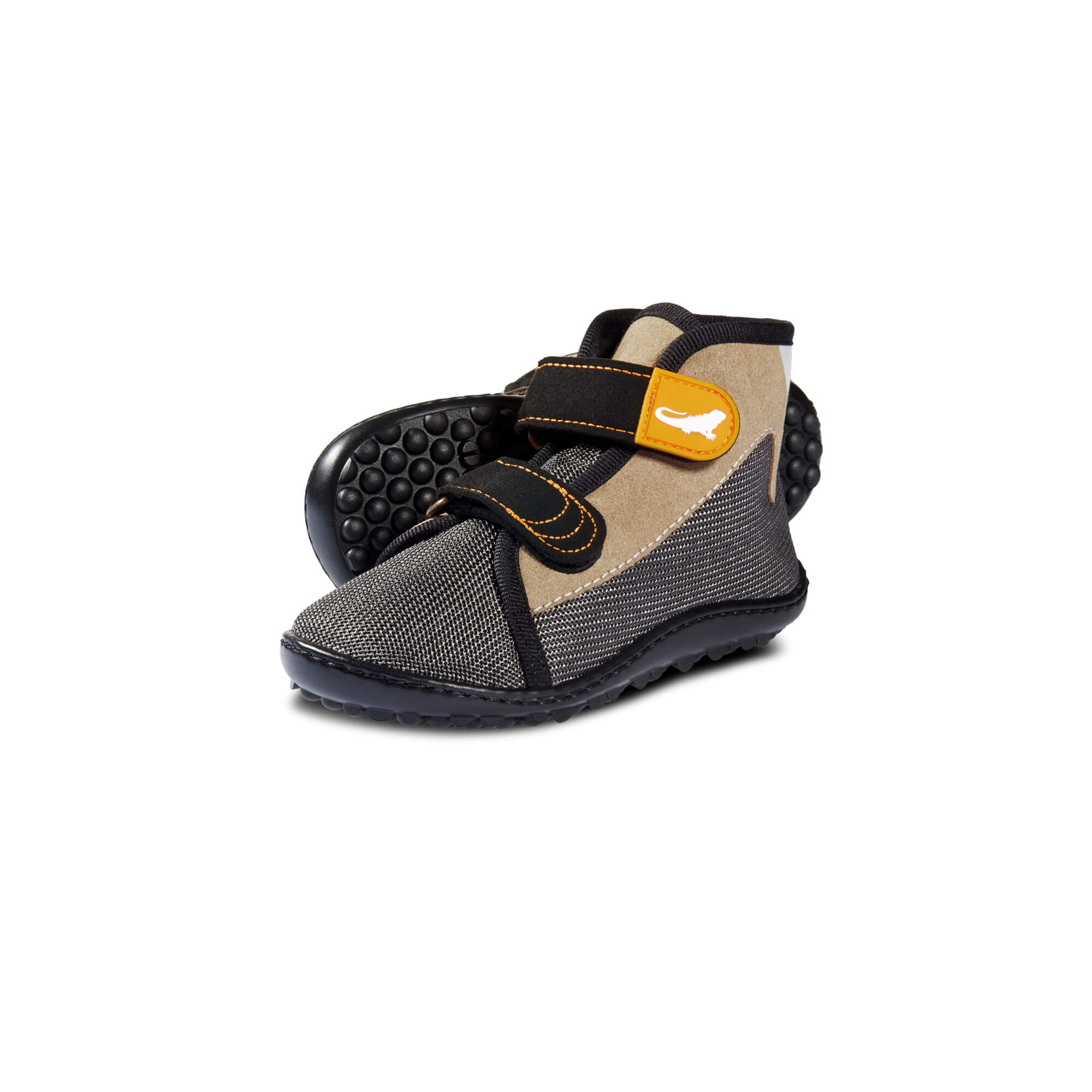 Leguanito Scippo Forester Klett Kinder Barfußschuhe, wasserabweisend. Diese Schuhe bieten hervorragenden Schutz vor Nässe und sind speziell für aktive Kinder entwickelt. Sie kombinieren Flexibilität mit dem Komfort eines Klettverschlusses.