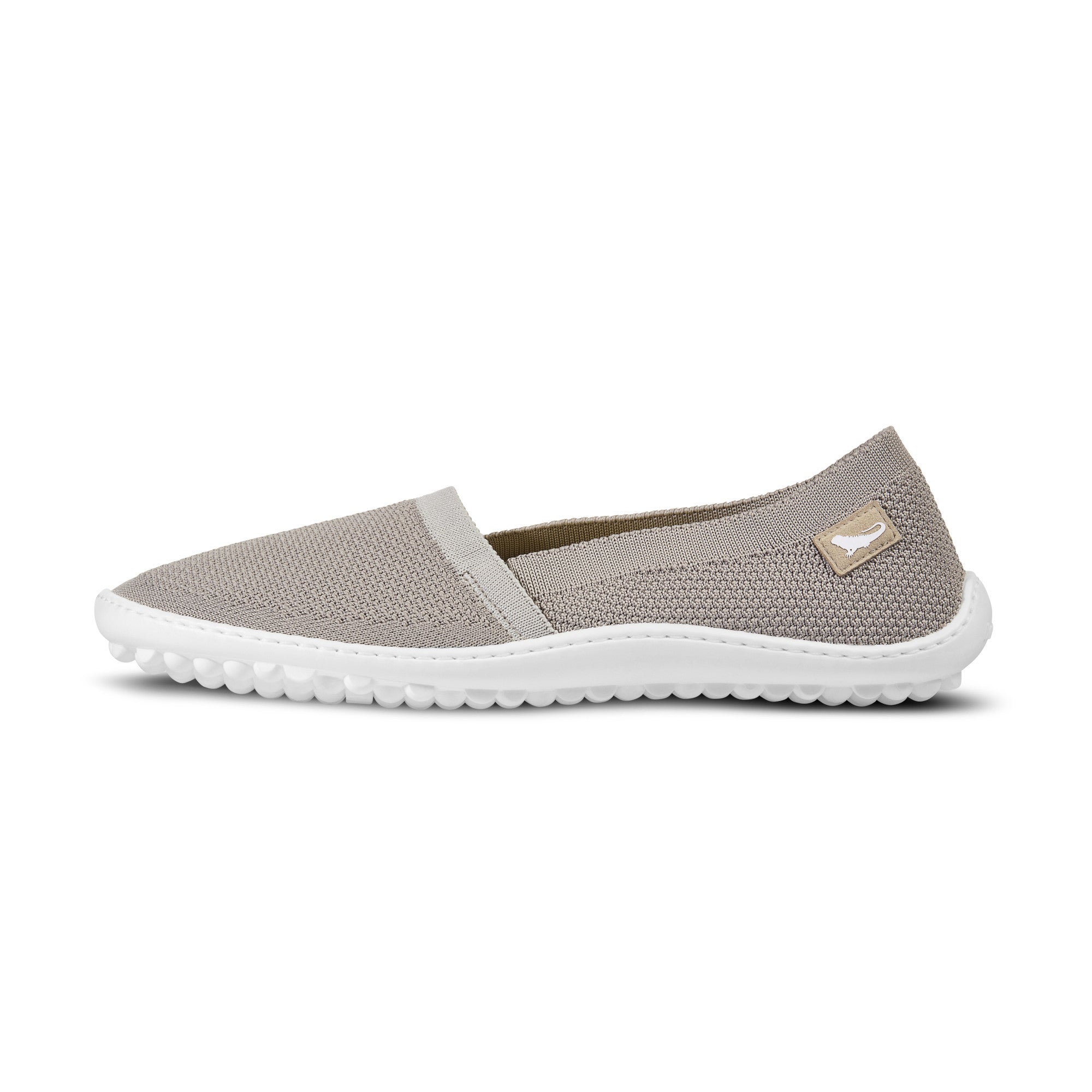Barfußschuhe Leguano Flair Sand als elegante Slipper für Damen mit Seitenansicht im linken Profil in unserem Onlineshop für Barfußschuhe entdecken