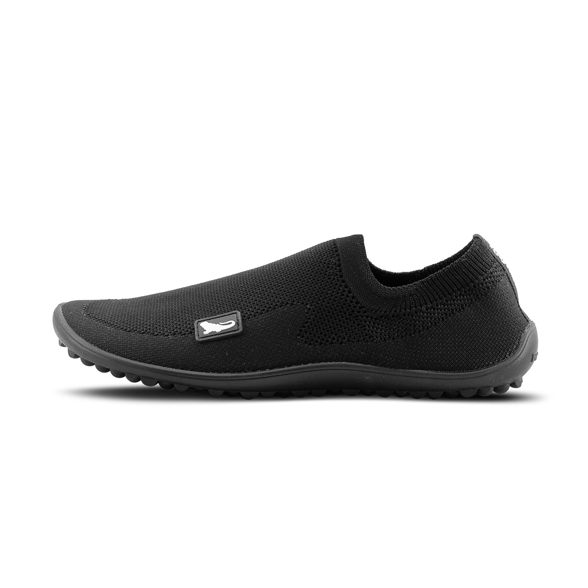 Linke Seitenansicht der schwarzen Leguano Score Unisex Barfußschuhe als flexible Slipper im Onlineshop für Barfußschuhe