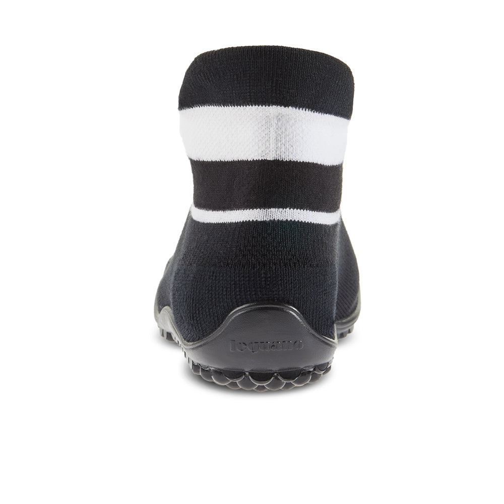 Leguano Sneaker in Schwarz mit weißem Bund, von hinten abgebildet und ideal für stilvolle Rückansichten und optimalen Komfort. Jetzt erhältlich im Onlineshop für Barfußschuhe.