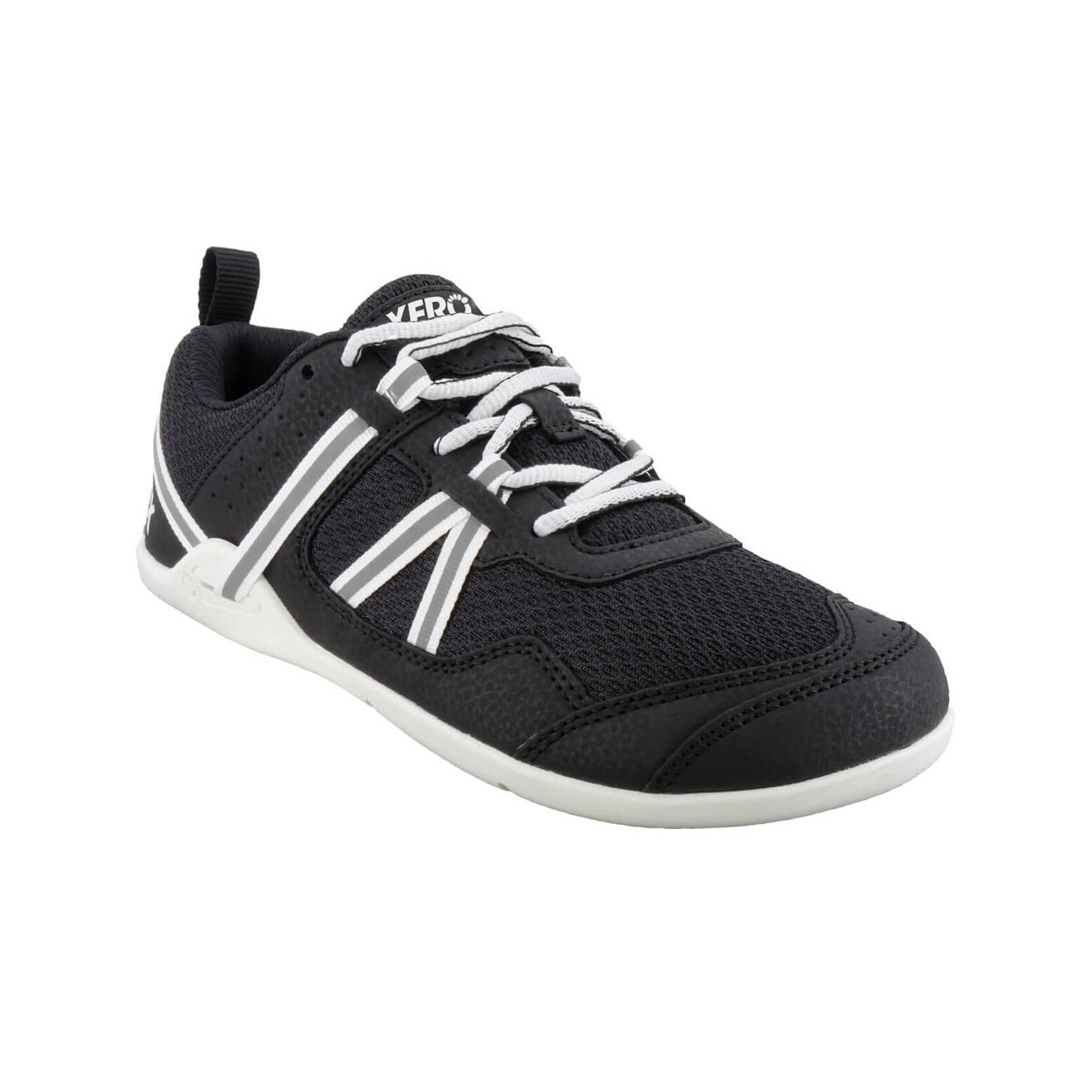 Schwarze und weiße Xero Shoes Prio Damen Sneaker als Barfußschuhe in unserem Onlineshop für Barfußschuhe