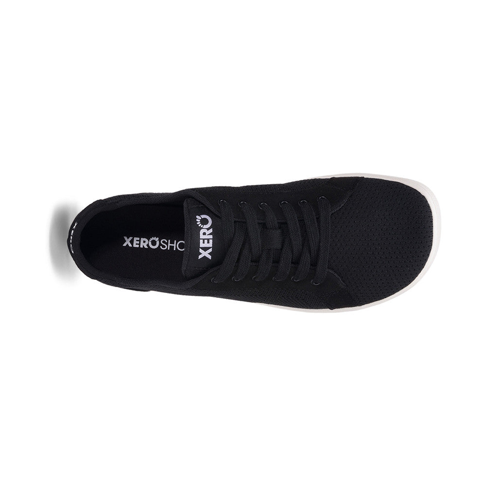 Xero Shoes Dillon Barfußschuhe für Damen in Schwarz aus der Perspektive von oben, bequem und perfekt für den Alltag. Erhältlich in unserem Onlineshop für Barfußschuhe.