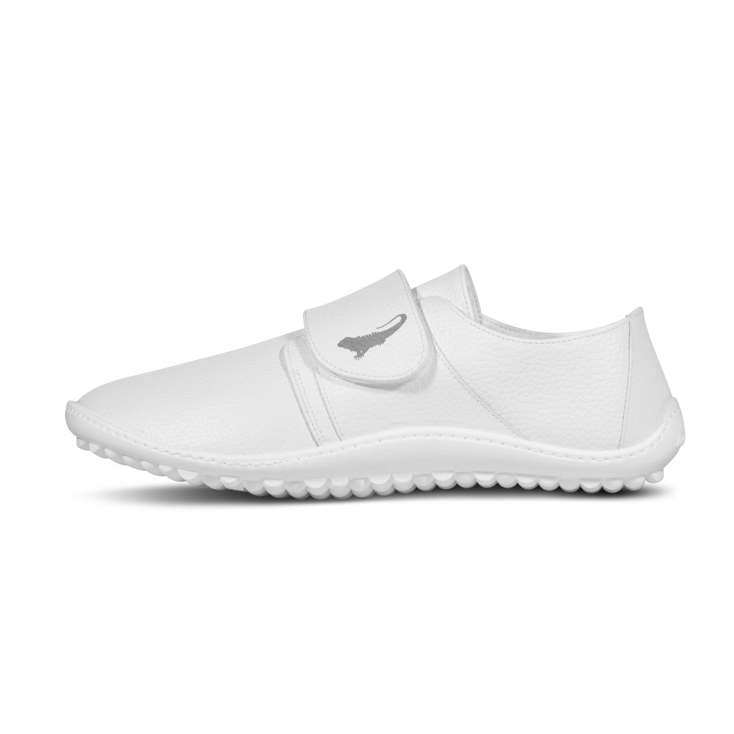 Leguano Care Barfußschuhe in Weiß, linke Seitenansicht, perfekt für Pflegeberufe, Ärzte, Apotheken und Krankenhäuser. Jetzt im Onlineshop für Barfußschuhe erhältlich.