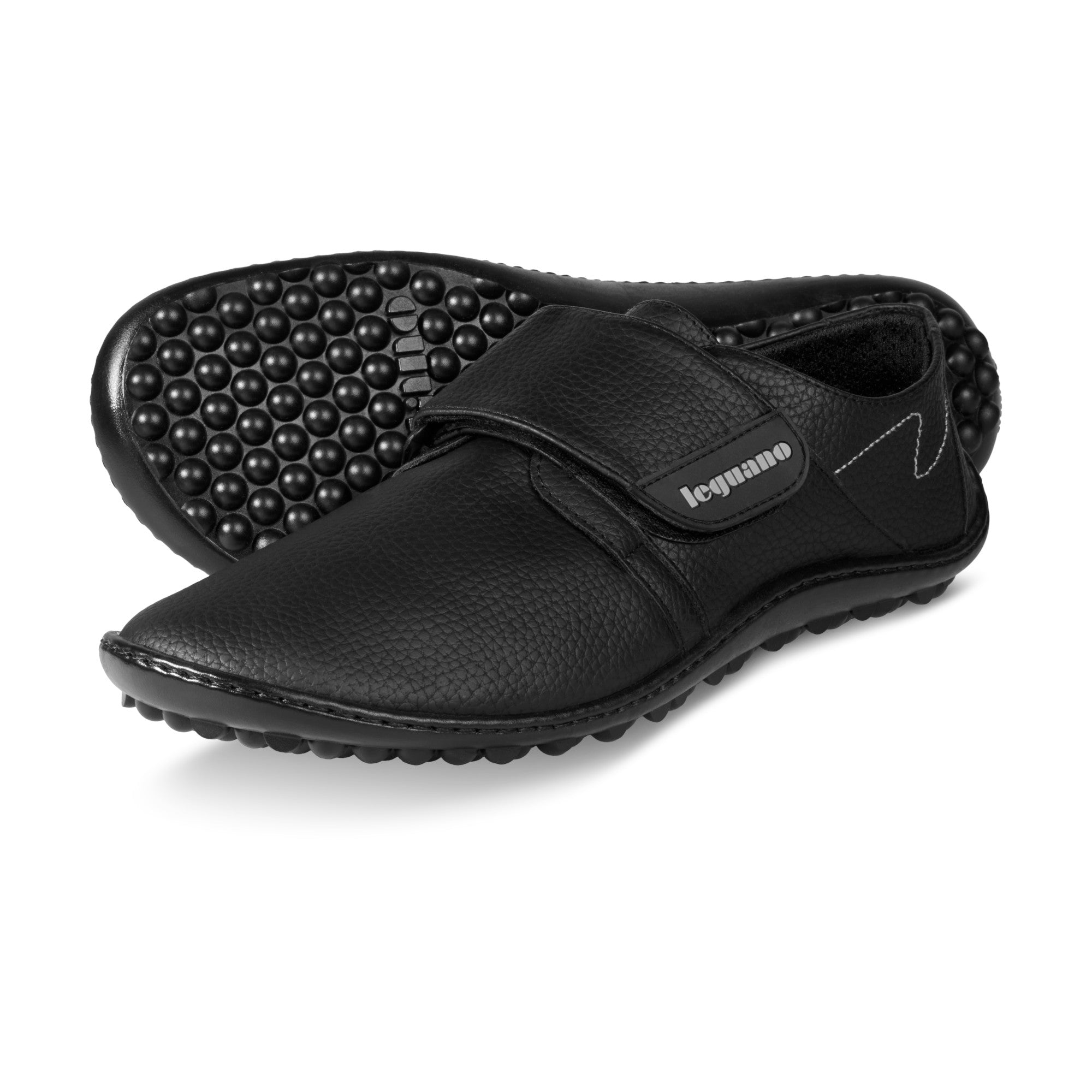 Schwarze Leguano Neron Barfußschuhe, wasserabweisende und flexible Sneaker für Alltag und Outdoor, verfügbar in unserem Onlineshop für Barfußschuhe.